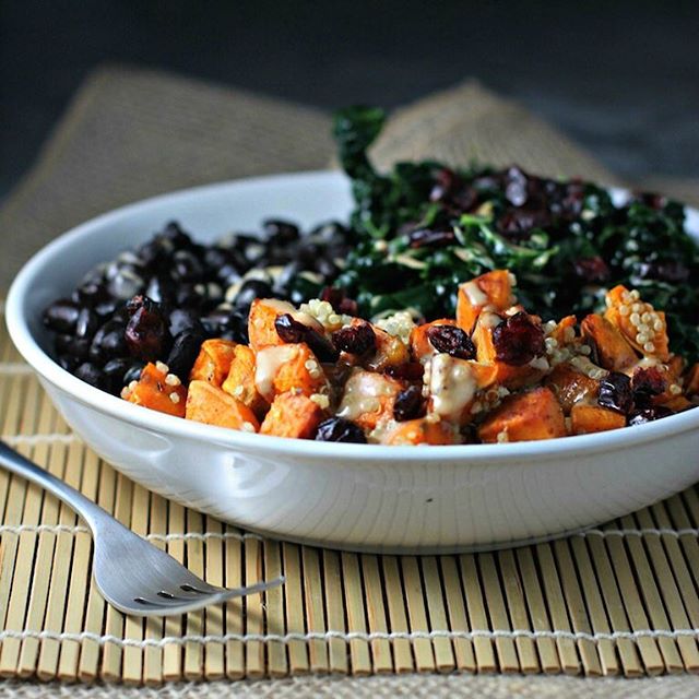 Kale Salad Bowl With Quinoa, Harissa Roasted Sweet Potatoes, Black Beans And Sweet Tahini