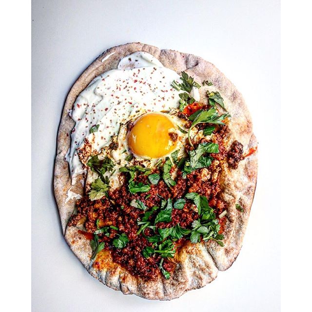Homemade Pita Topped With Chorizo, Fried Eggs And Garlic Lemon Sauce Recipe The Feedfeed