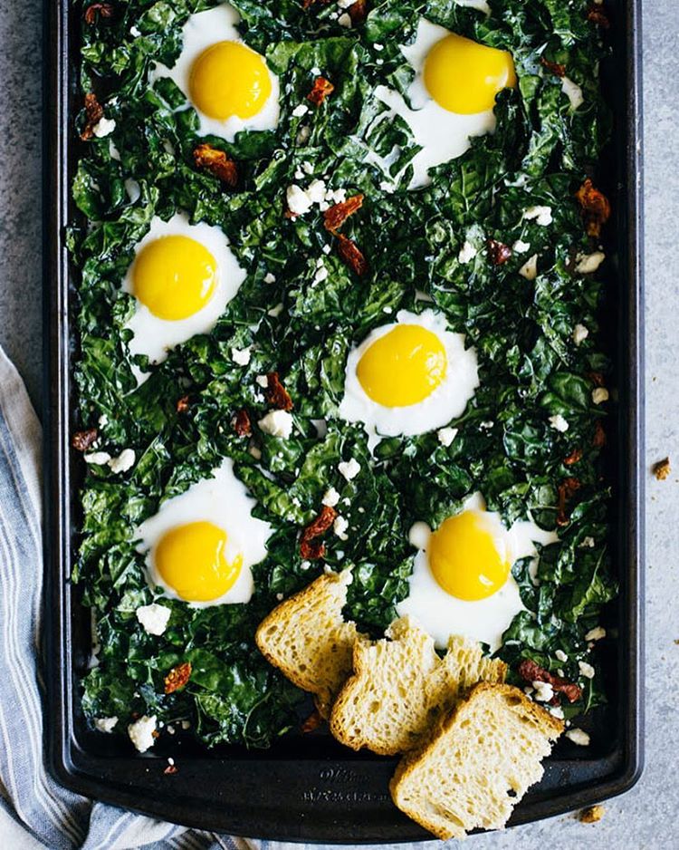 Sheet Pan Baked Eggs With Kale, Goat Cheese And Sundried Tomatoes by