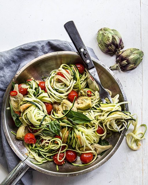 Zucchini Noodles Aglio E Olio Style With Artichoke Hearts And Cherry