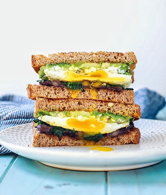 Breakfast Sandwich With Avocado, Black Beans, Feta Cheese And Kale