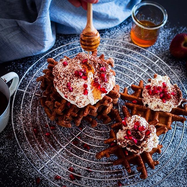 Grated Apple & Cocoa Waffle With Whipped Cream, Pomegranate Seeds And Honey by studieinsuess