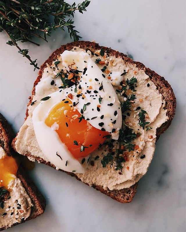 Hummus Toast With Soft Boiled Egg, Fresh Thyme And Everything Bagel