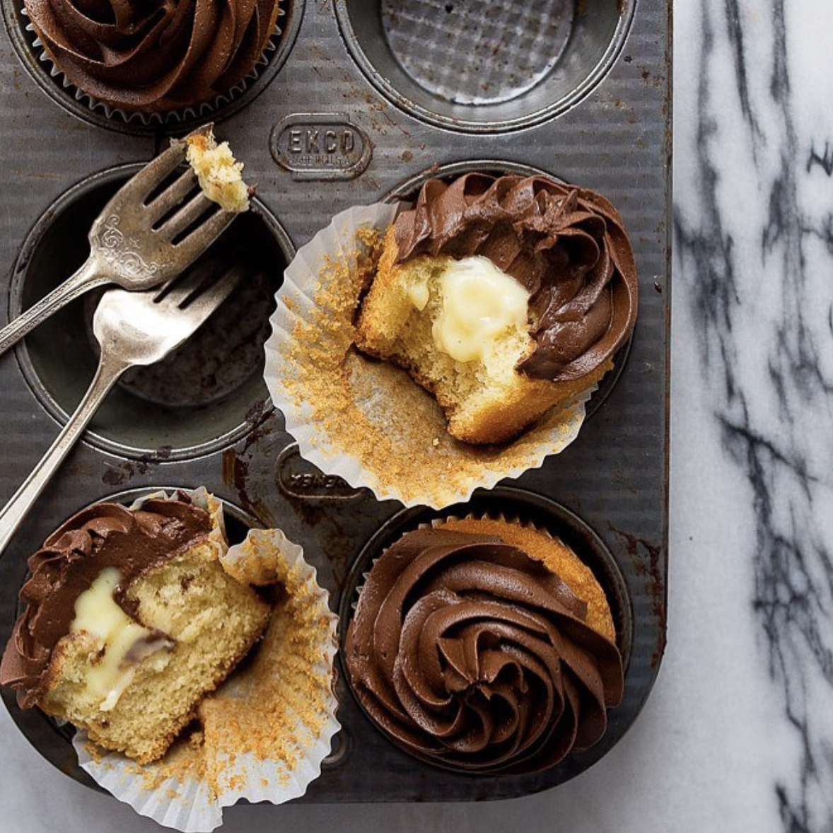 Vanilla Cream Filled Cupcakes with Chocolate Frosting by dessertfortwo