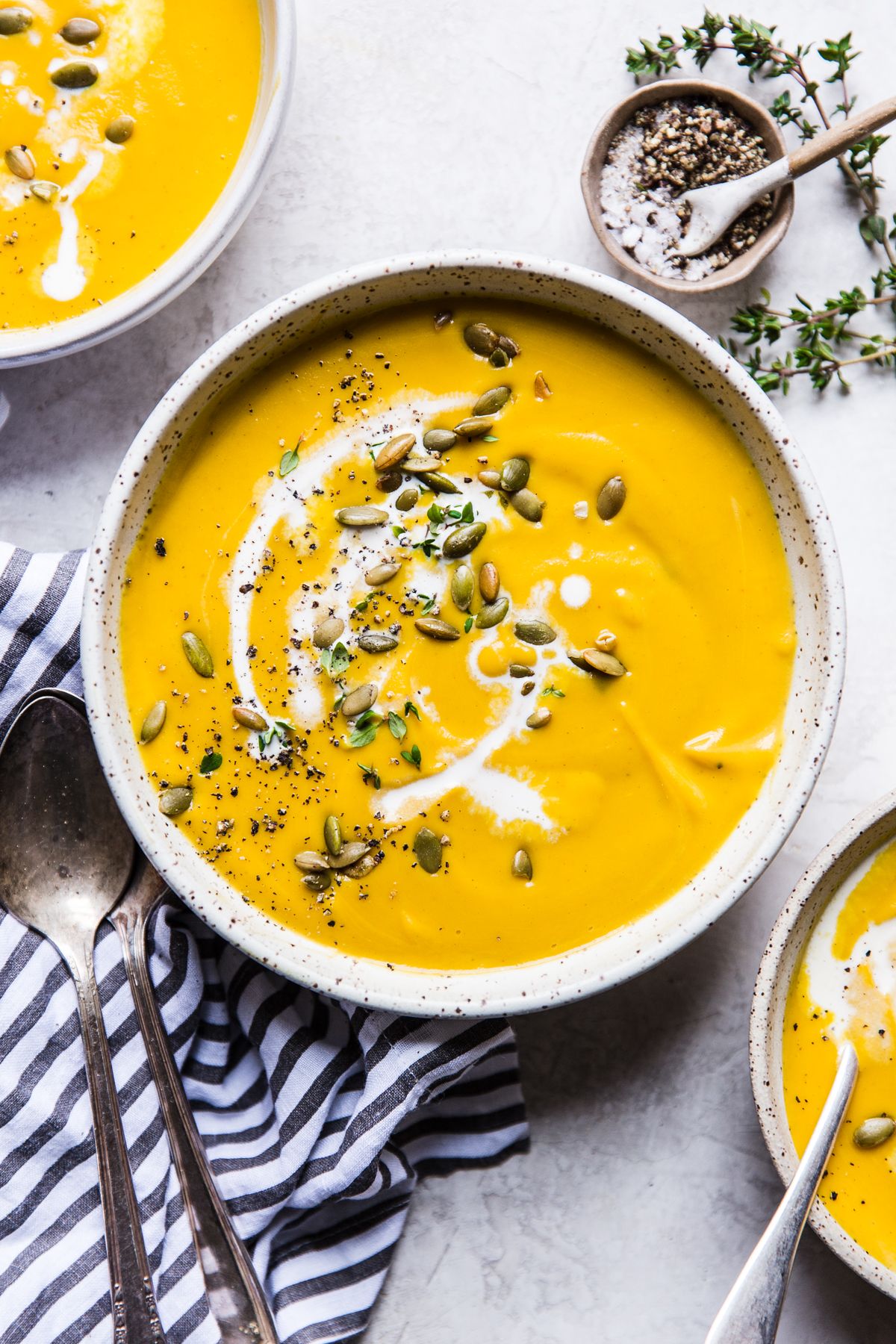 Creamy Butternut Squash and Apple Soup by themodernproper | Quick