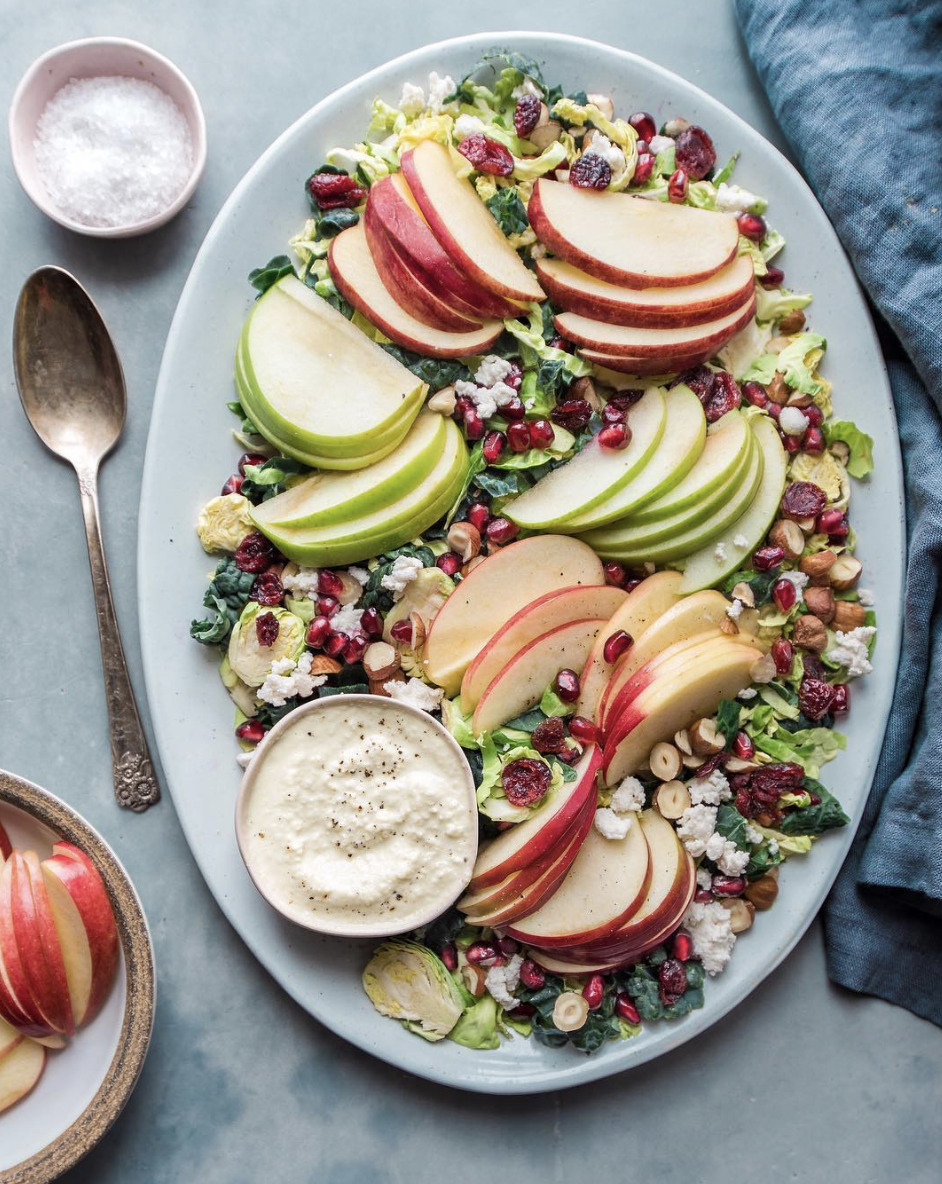 Kale Brussel Sprouts And Apple Salad With Cashew Caesar Dressing Recipe By Nisha Vora The Feedfeed