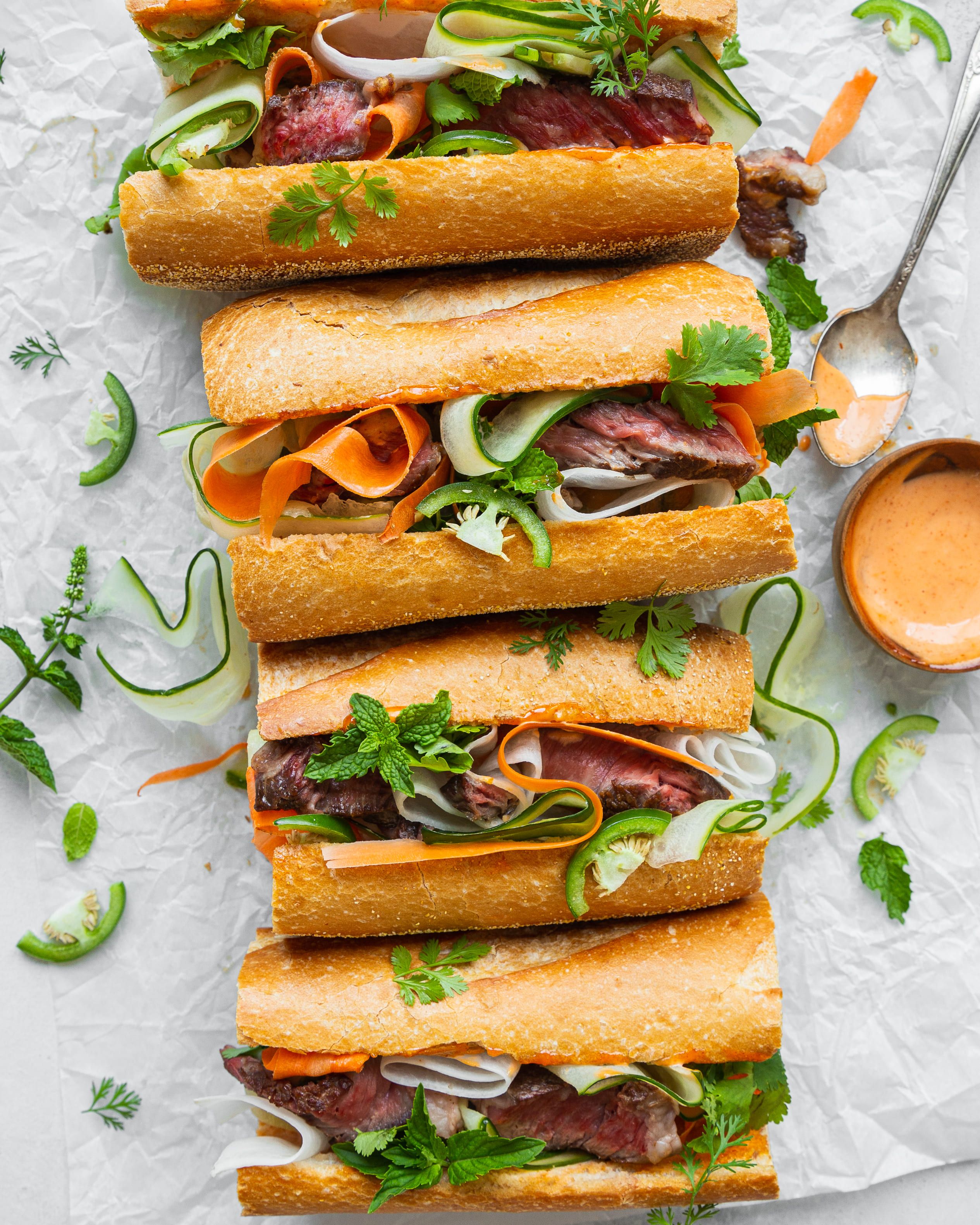 Banh Mi Style Rib Eye Sandwiches with Quick Pickled Daikon, Cucumber and Carrots image
