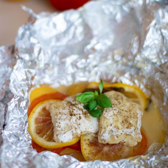 Baked Cod with Tomatoes Potatoes and Lemon by alwaysusebutter | Quick
