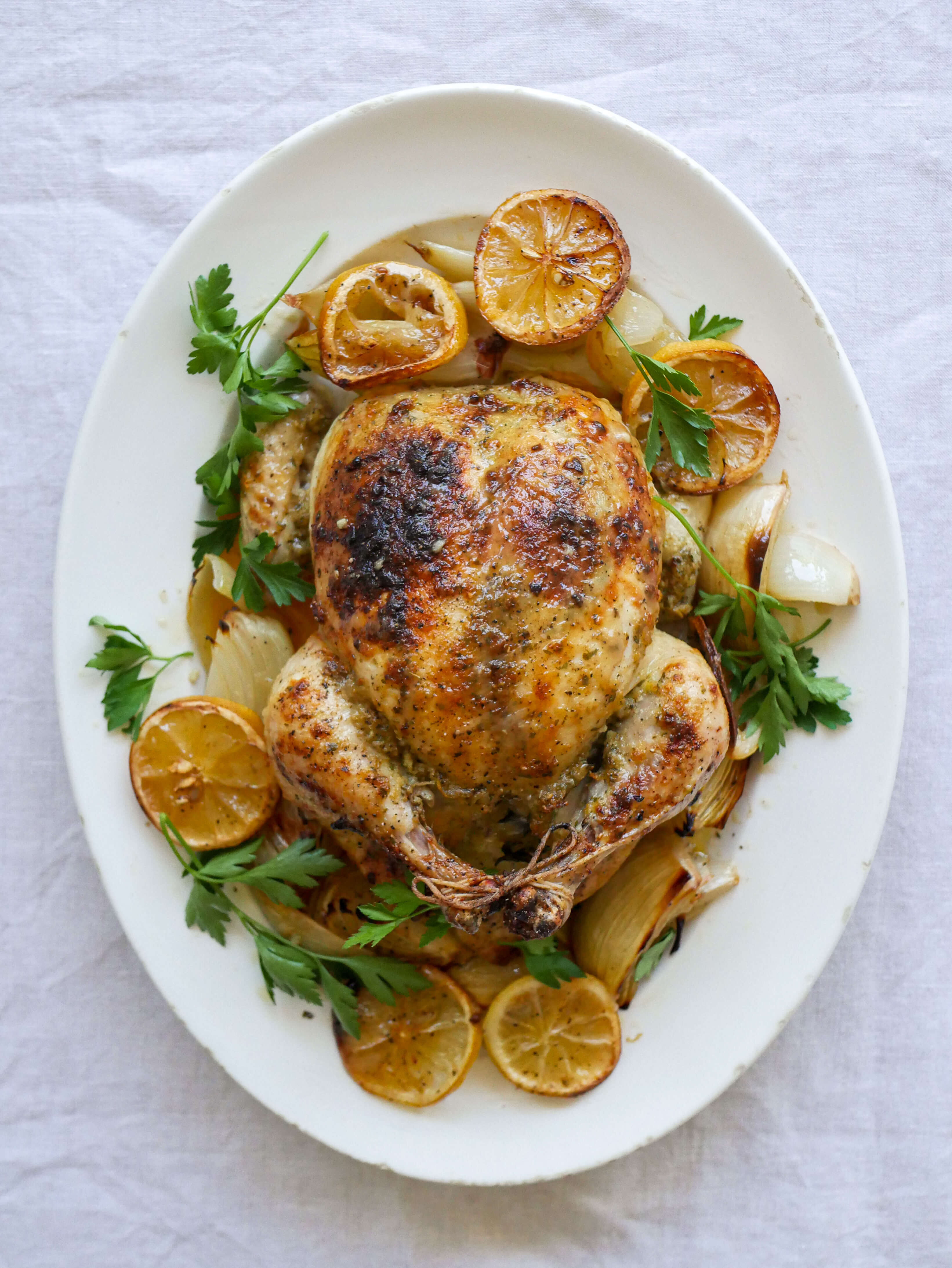 Garlicky Herbed Spatchcock Chicken Roast with Grapes and Onions
