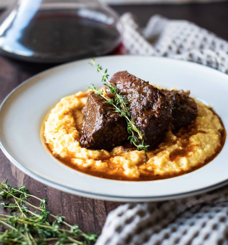 Wine Braised Short Ribs over Cheesy Grits Recipe | The Feedfeed