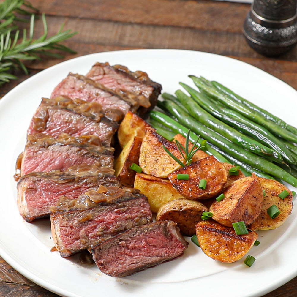 New York Strip Steak with Rosemary Onion Confit served with Duck Fat ...