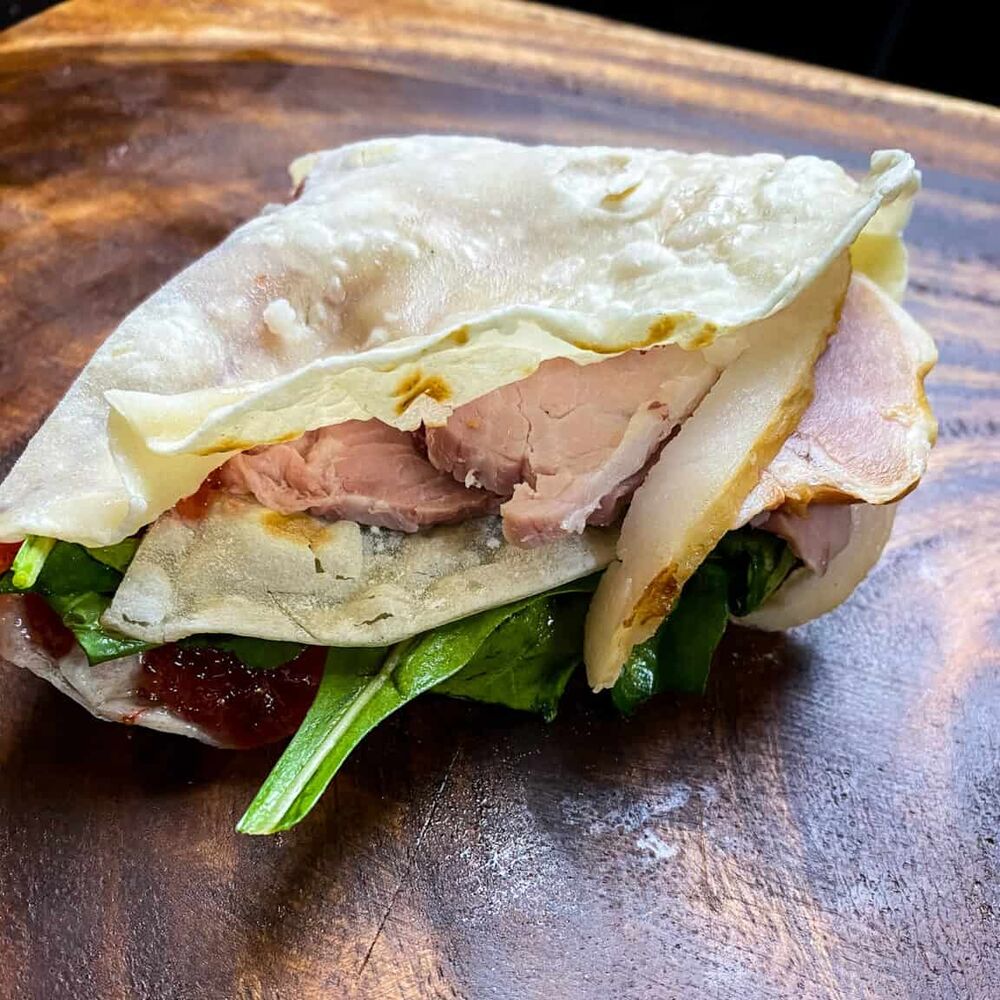 TOASTED HAM AND CHEESE SOURDOUGH TORTILLA WRAP (W/ STRAWBERRY RASPBERRY