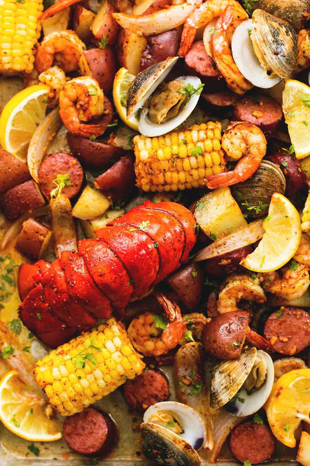 Sheet Pan Clam Bake with Corn, Shrimp, Lobster, Potatoes and Andouille ...