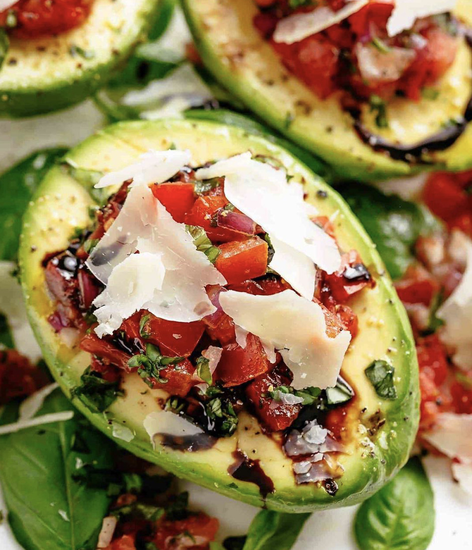 Bruschetta Stuffed Avocados Topped With Parmesan And Balsamic Glaze Recipe By Karina Food Blogger The Feedfeed